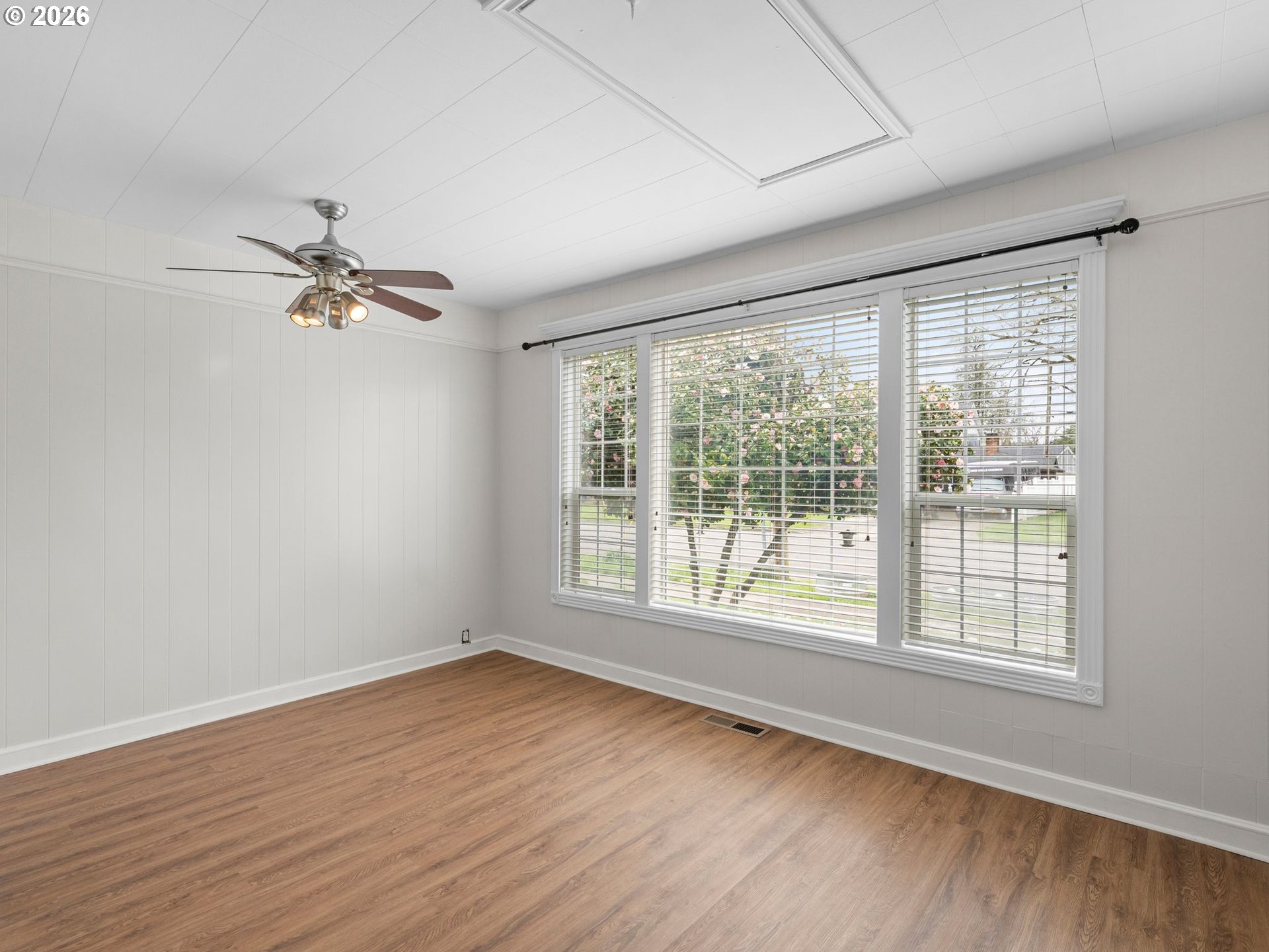 204 South Main Street Newberg, OR 97132 - Photo 8 of 28 a view of a livingroom with a ceiling fan and hardwood floor
