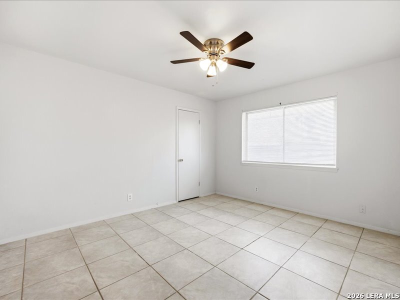 134 Robinhood Kenedy, TX 78119 - Photo 19 of 26 a view of an empty room with a window