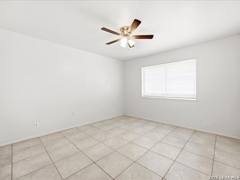 134 Robinhood Kenedy, TX 78119 - Photo 20 of 26 a view of an empty room with a window