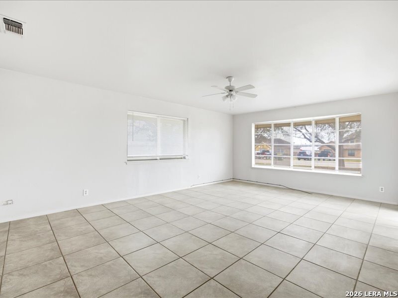 134 Robinhood Kenedy, TX 78119 - Photo 5 of 26 an empty room with windows