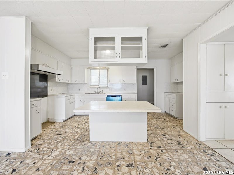 134 Robinhood Kenedy, TX 78119 - Photo 10 of 26 a kitchen with stainless steel appliances a refrigerator sink and cabinets