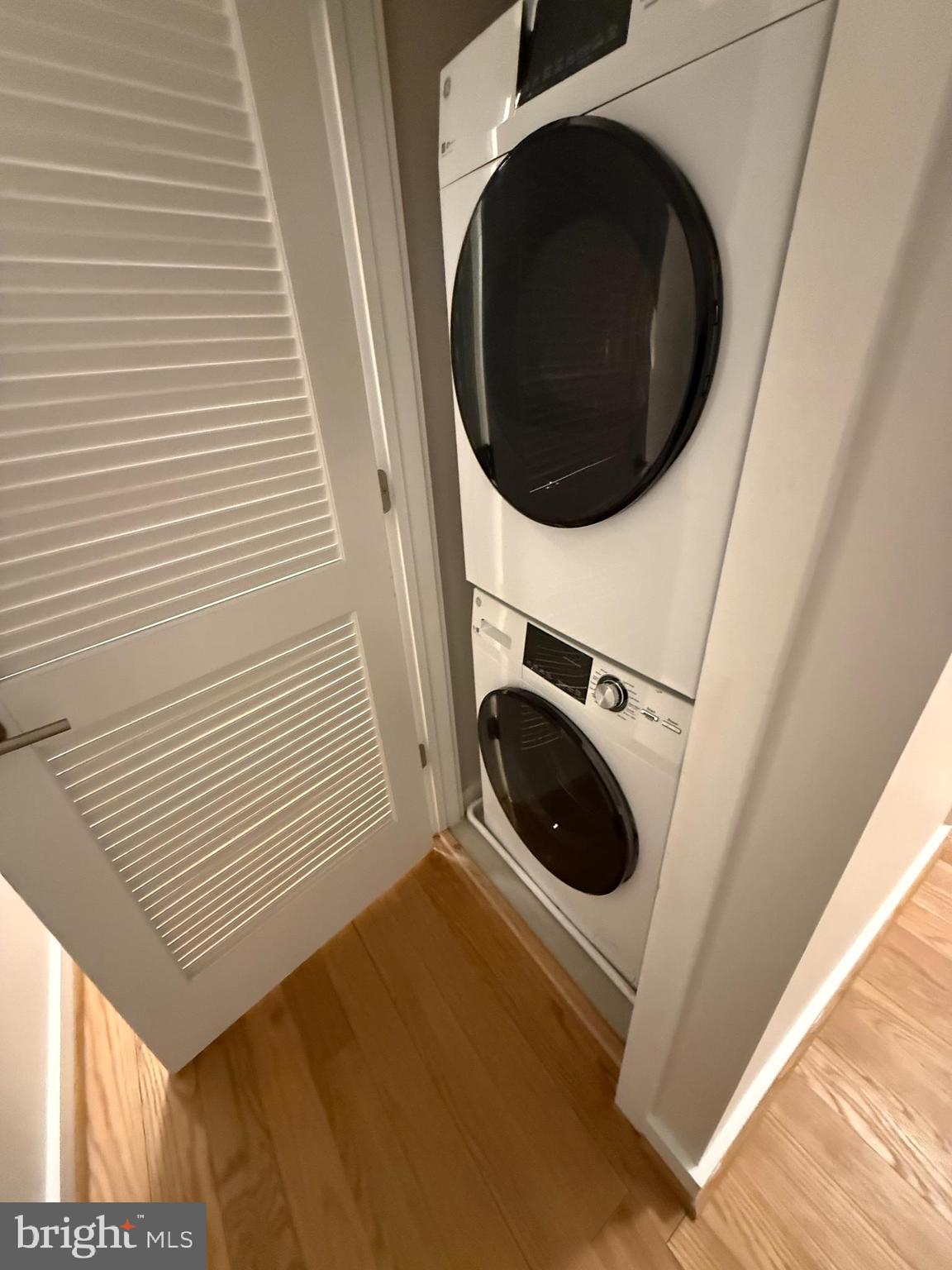 2009 Benning Road Northeast, Unit 1 Washington, DC 20002 - Photo 6 of 11 a utility room with dryer and washer