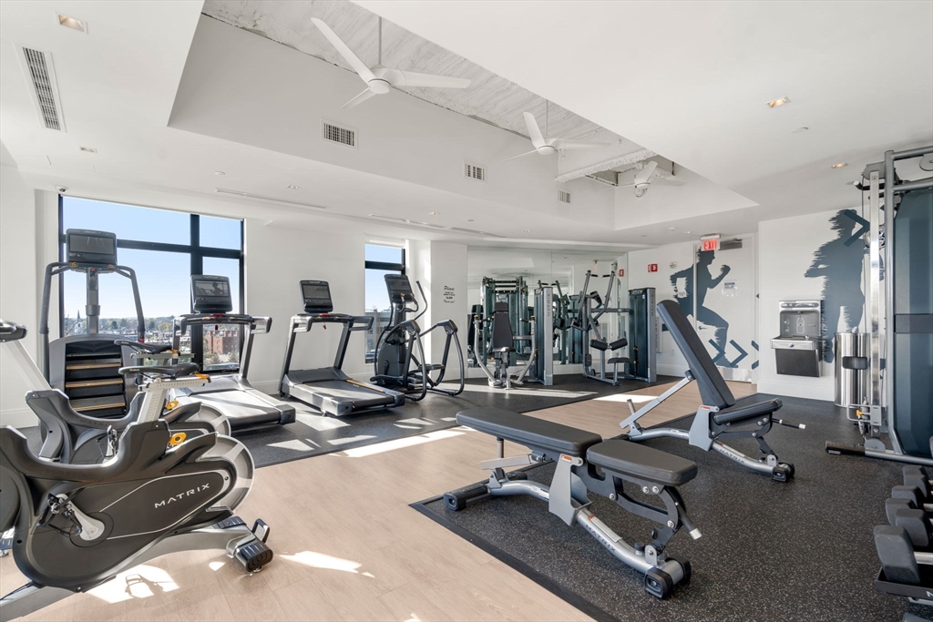 191 Washington Street, Unit 615 Boston, MA 02135 - Photo 19 of 23 a view of a room with gym equipment