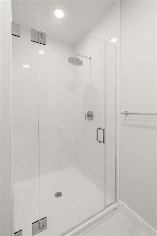 191 Washington Street, Unit 615 Boston, MA 02135 - Photo 8 of 23 a bathroom with a shower