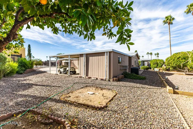 a view of a house with roof deck and a potted plant