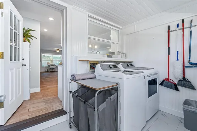 a kitchen with a stove and a refrigerator