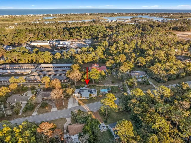 an aerial view of residential building and lake view