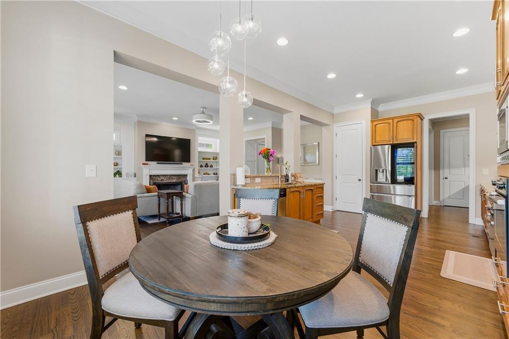 2398 St Davids Square, Unit 16 Kennesaw, GA 30152 - Photo 11 of 48 a dining room with furniture and wooden floor