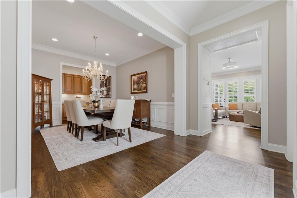 2398 St Davids Square, Unit 16 Kennesaw, GA 30152 - Photo 14 of 48 a view of a dining room with furniture and wooden floor