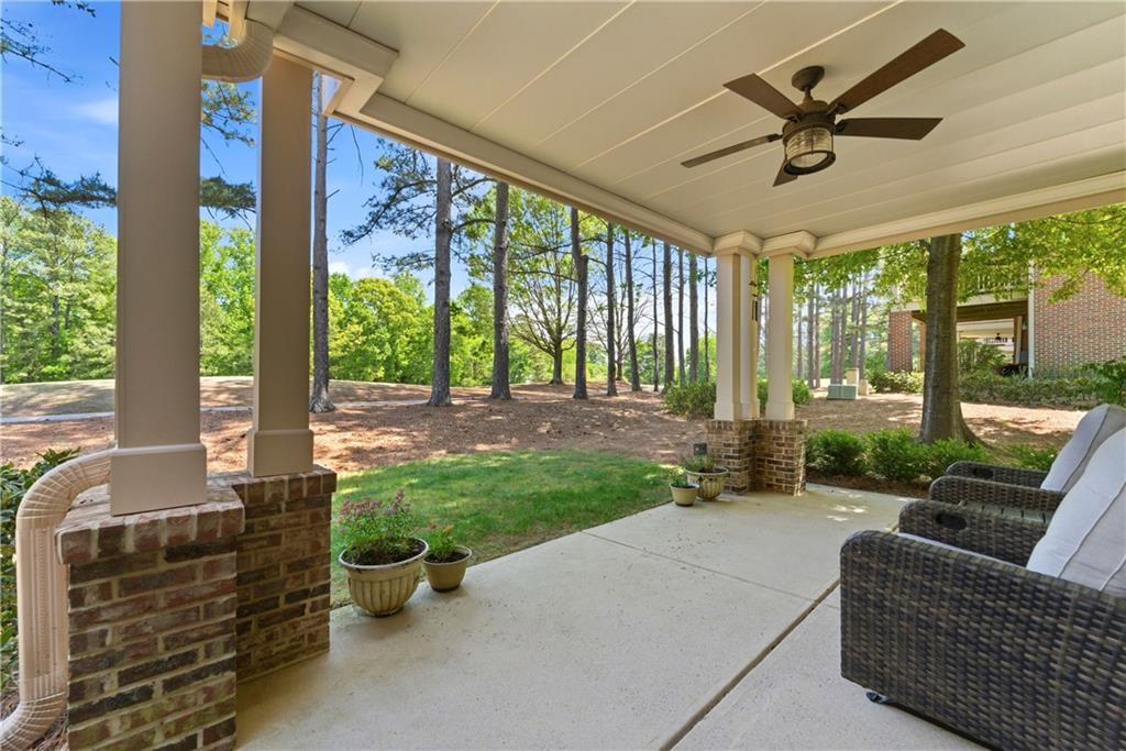 2398 St Davids Square, Unit 16 Kennesaw, GA 30152 - Photo 22 of 48 a living room with furniture and a floor to ceiling window