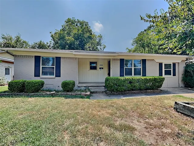 a view of a house with a patio