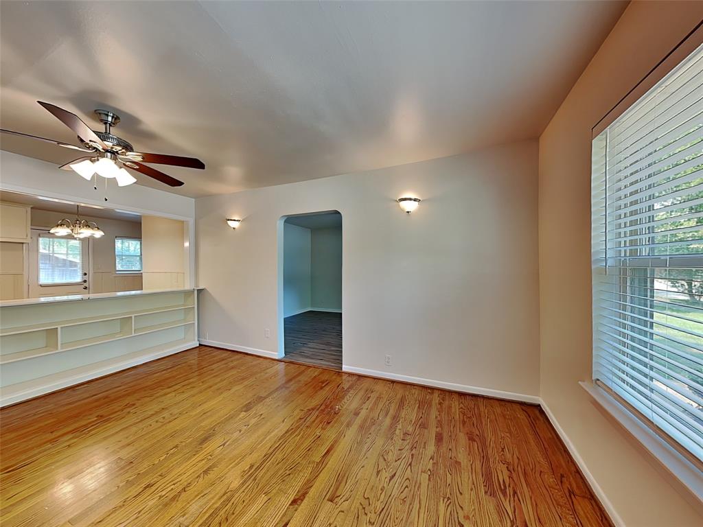 1002 Noble Avenue Carrollton, TX 75006 - Photo 3 of 16 a view of an empty room and window