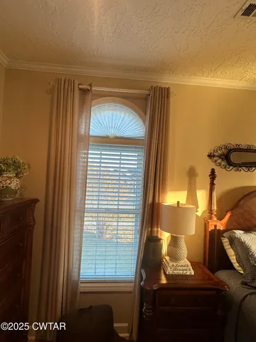 a room with furniture and a window