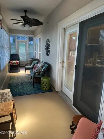 a view of a table and chairs on the roof deck