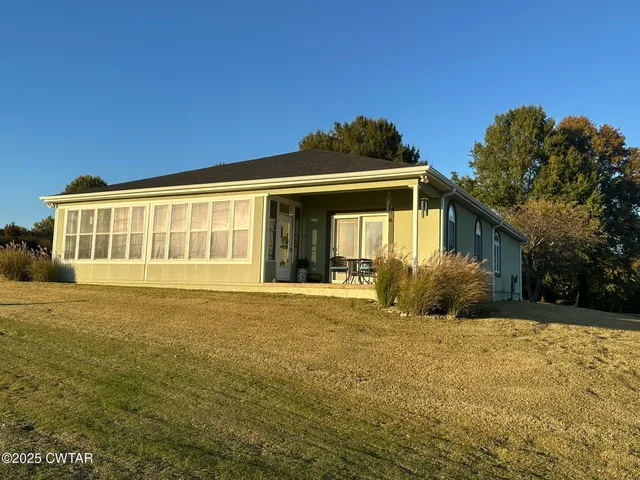 a front view of a house with a outdoor space