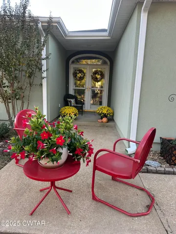 a view of a chairs in a patio