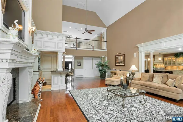 a kitchen with stainless steel appliances granite countertop a stove and a refrigerator