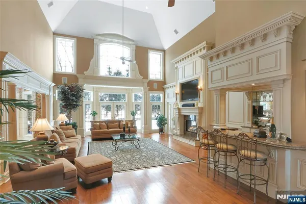 a bed room with a bed and a chandelier