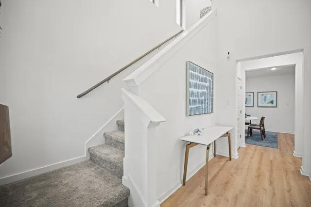 a view of livingroom with furniture and wooden floor