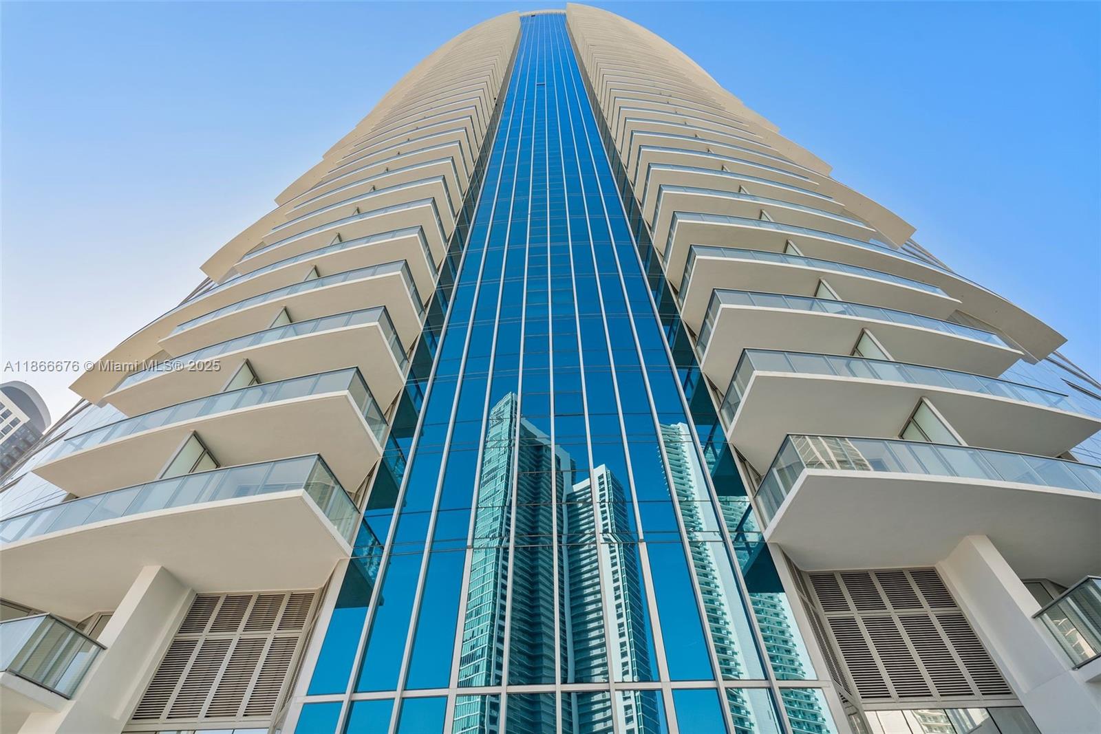 851 Northeast 1st Avenue, Unit 3203 Miami, FL 33132 - Photo 18 of 48 a view of a tall building