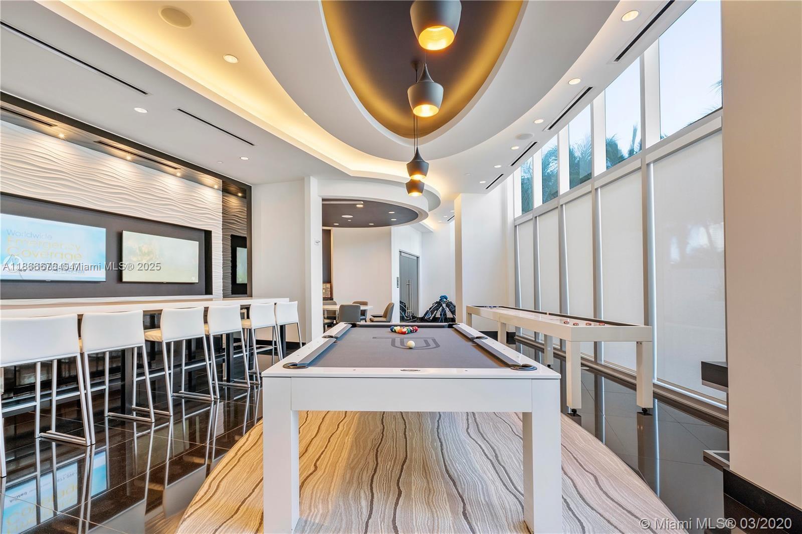 851 Northeast 1st Avenue, Unit 3203 Miami, FL 33132 - Photo 26 of 48 a view of a living room with a large window