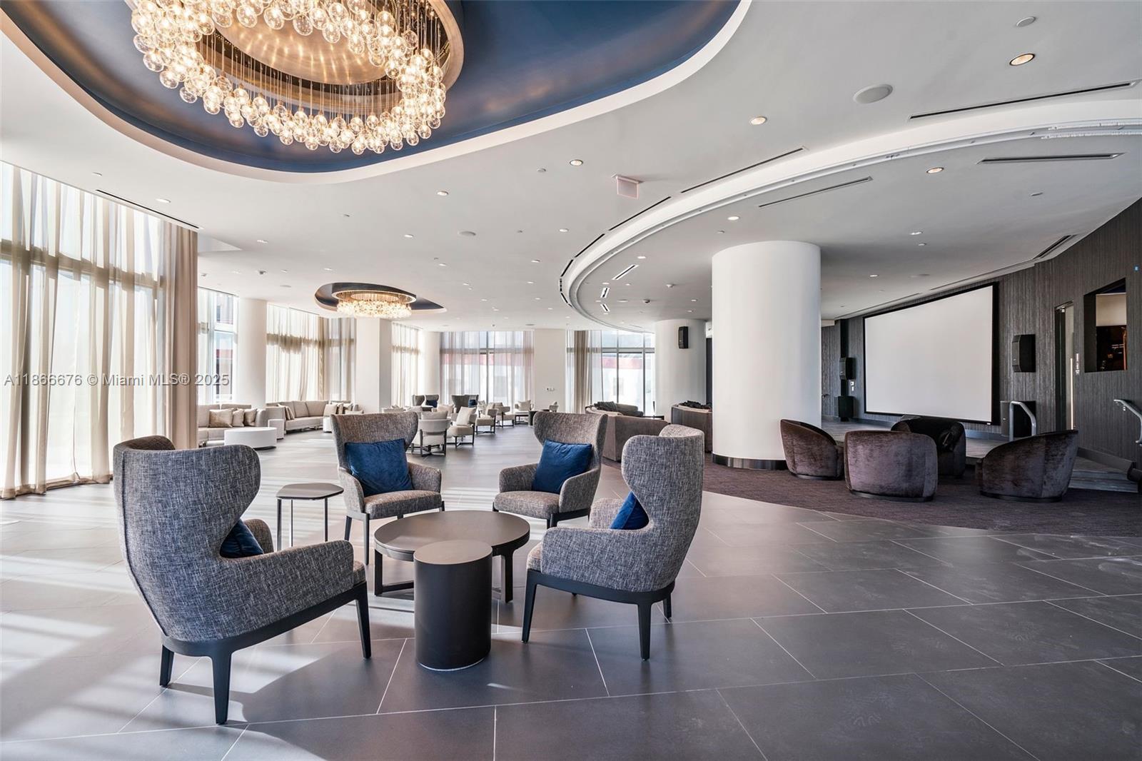 851 Northeast 1st Avenue, Unit 3203 Miami, FL 33132 - Photo 38 of 48 a living room with lots of furniture and a large window