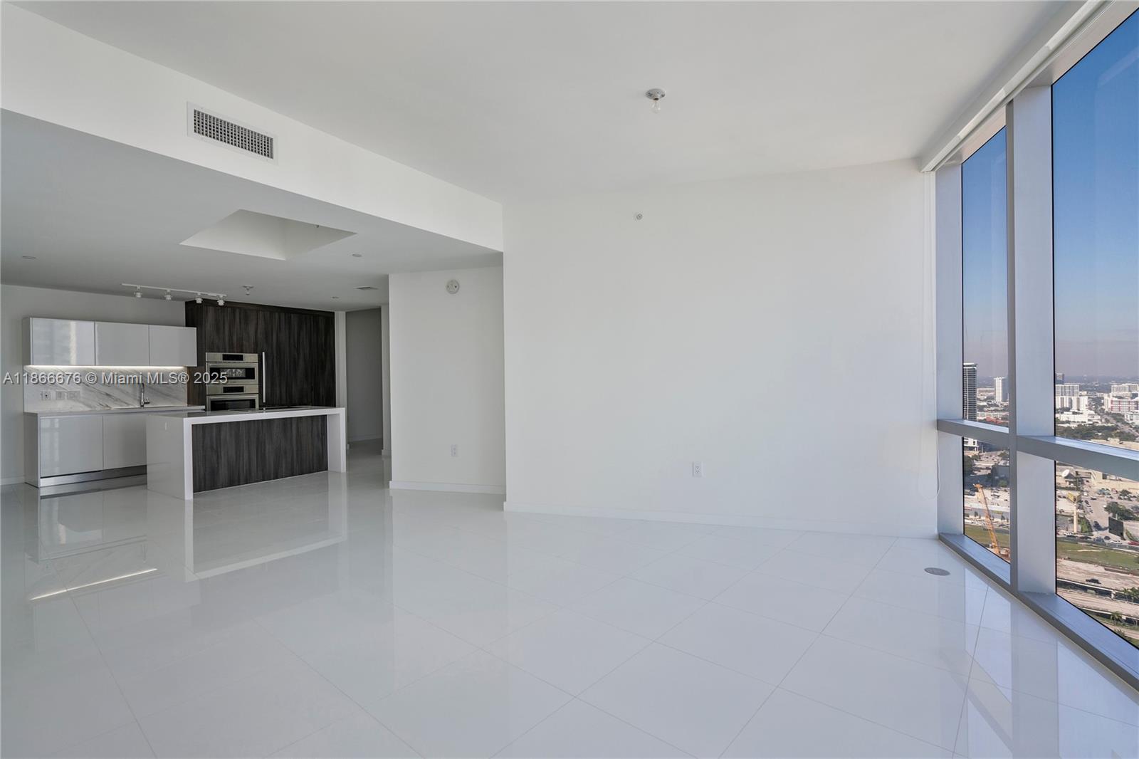851 Northeast 1st Avenue, Unit 3203 Miami, FL 33132 - Photo 4 of 48 a view of kitchen with sink and refrigerator