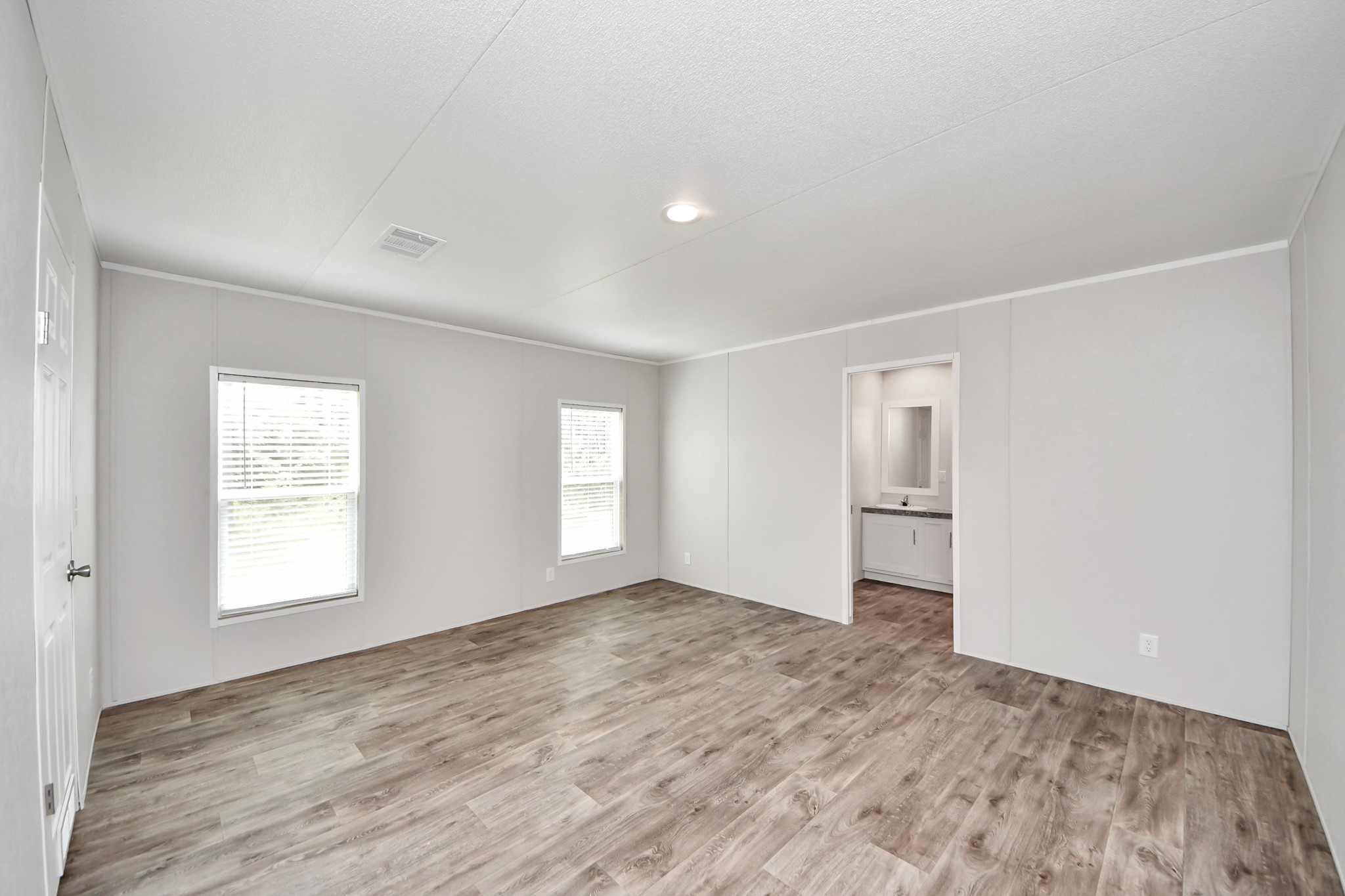 1560 Brown Road Willis, TX 77378 - Photo 19 of 28 an empty room with windows and closet