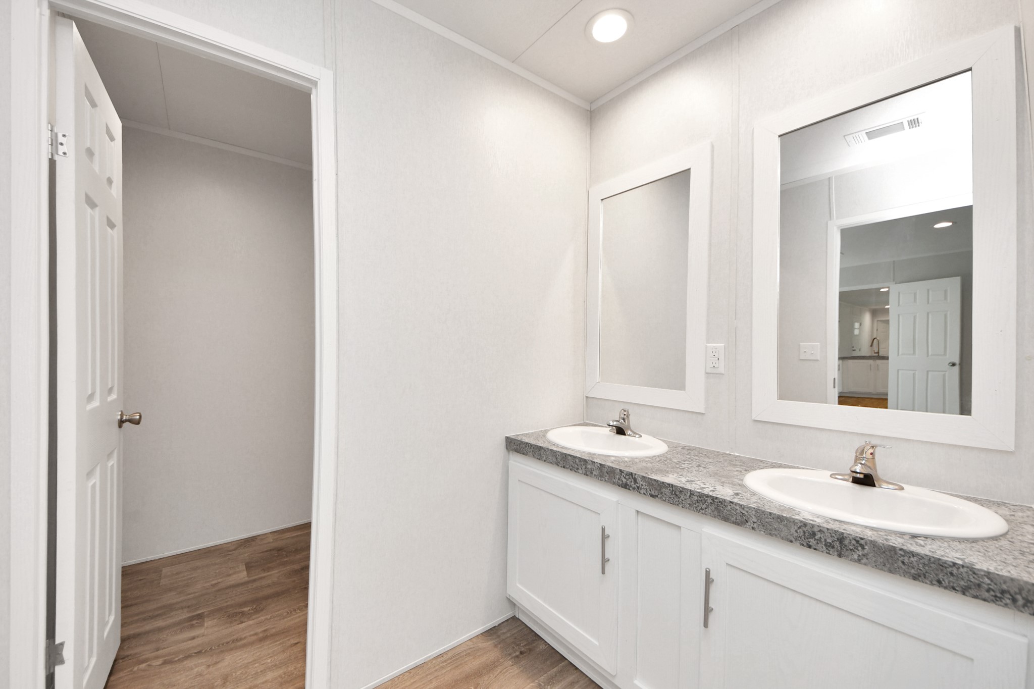 1560 Brown Road Willis, TX 77378 - Photo 21 of 28 a bathroom with a granite countertop sink and a mirror
