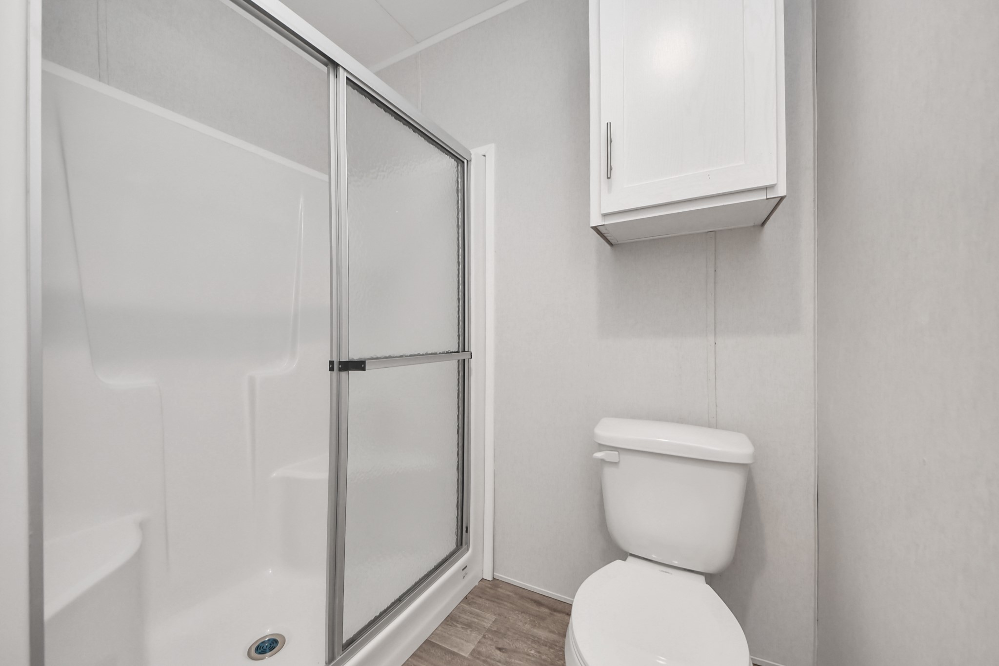 1560 Brown Road Willis, TX 77378 - Photo 22 of 28 a bathroom with a toilet and a shower