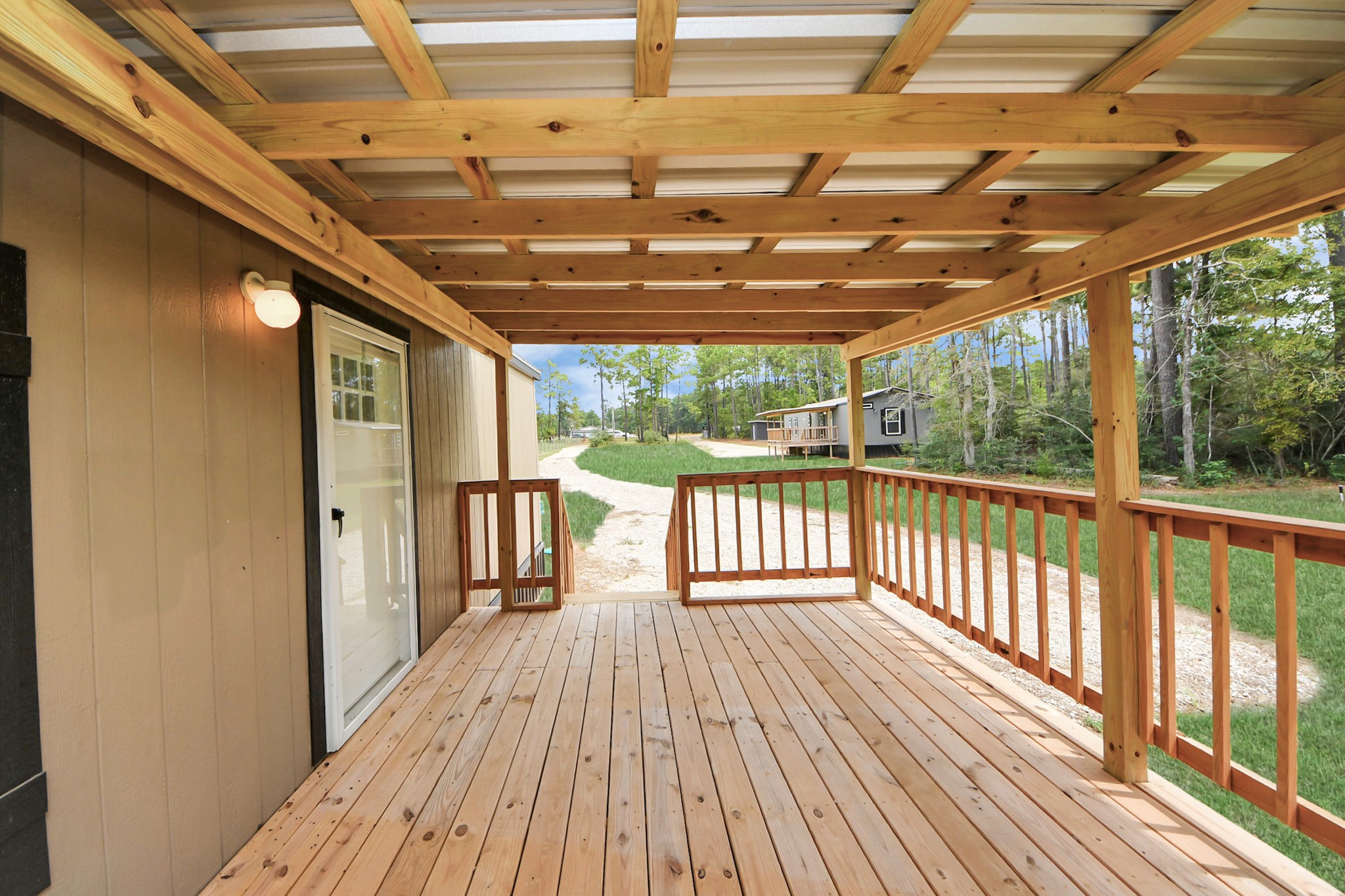 1560 Brown Road Willis, TX 77378 - Photo 4 of 28 a view of porch with wooden floor