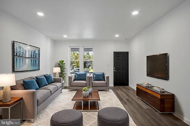 a kitchen with sink cabinets and window