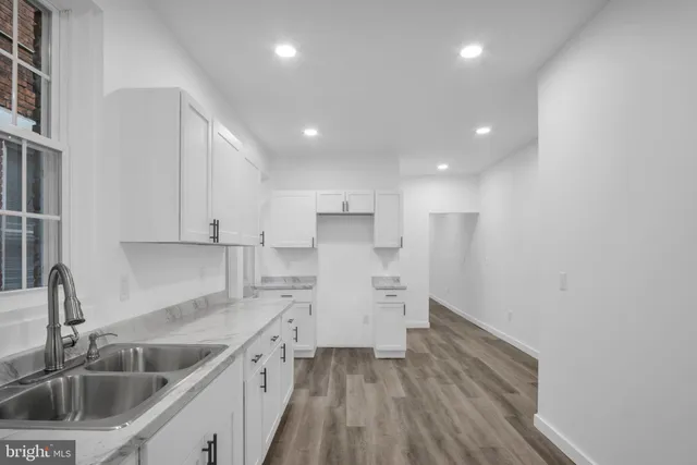 a bathroom with a sink and a toilet