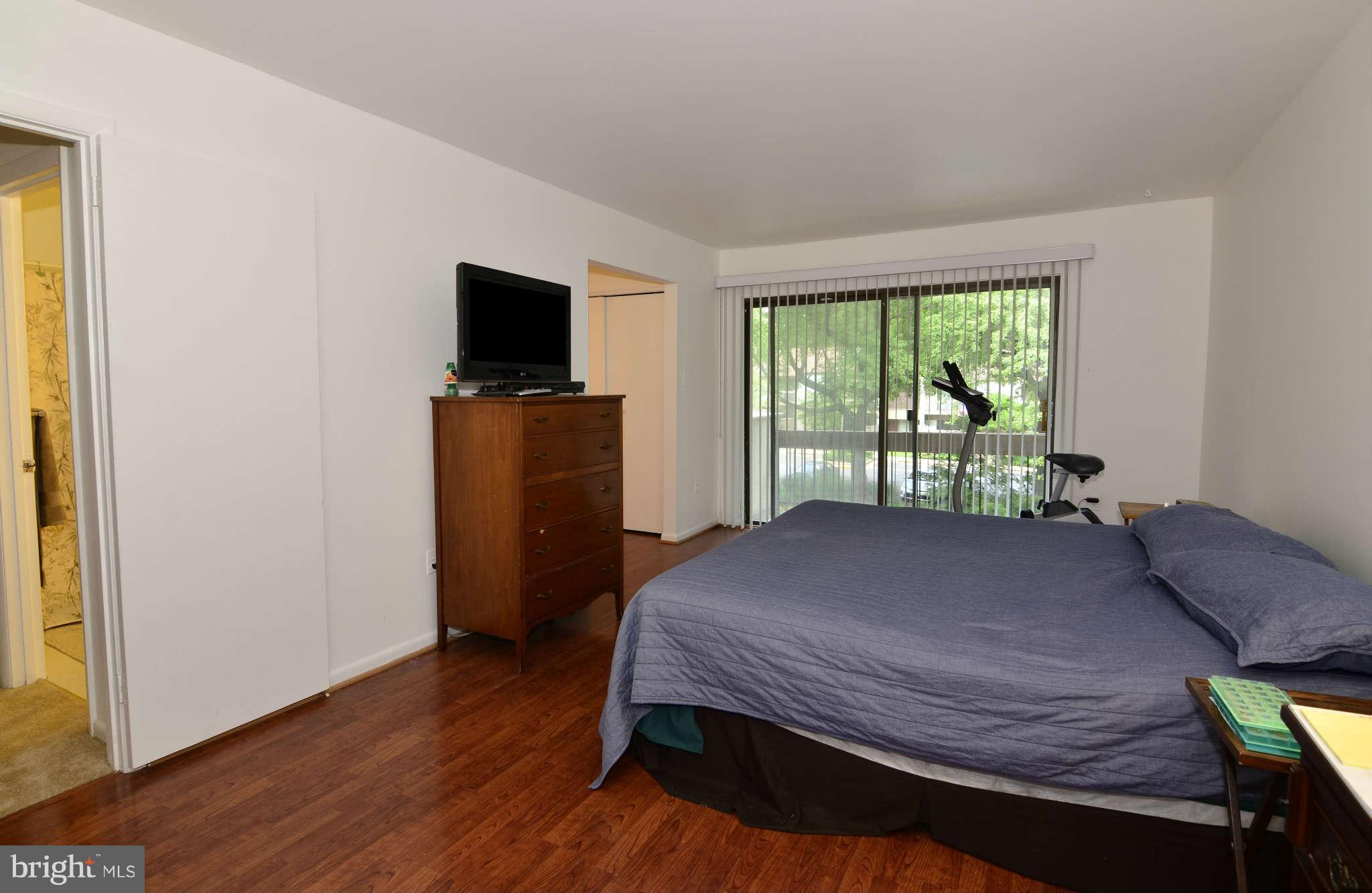 11703 Newbridge Court Reston, VA 20191 - Photo 14 of 25 Master bedroom with three separate closets