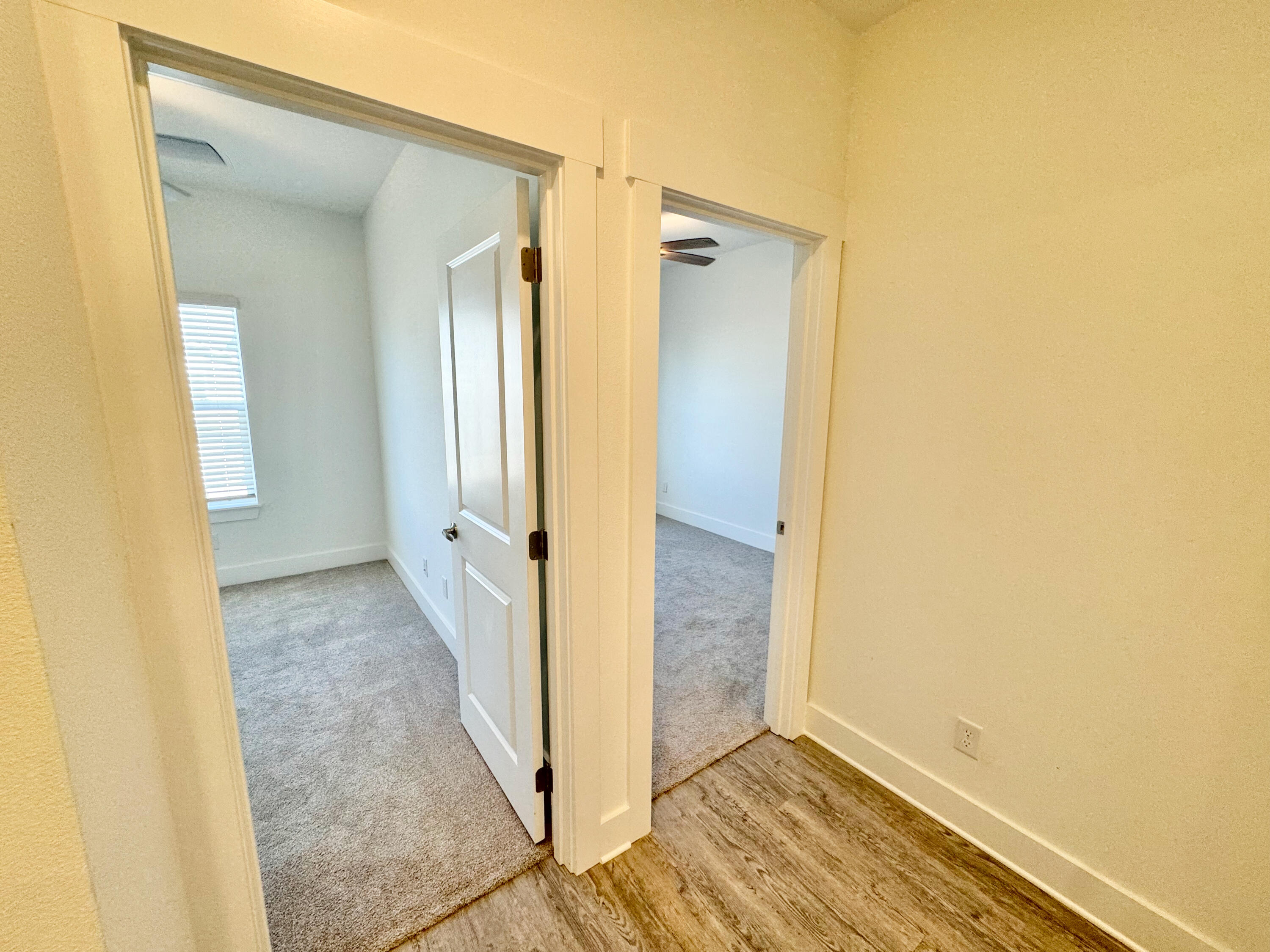 103 Date Palm Lane Freeport, FL 32439 - Photo 22 of 33 a view of a hallway with wooden floor