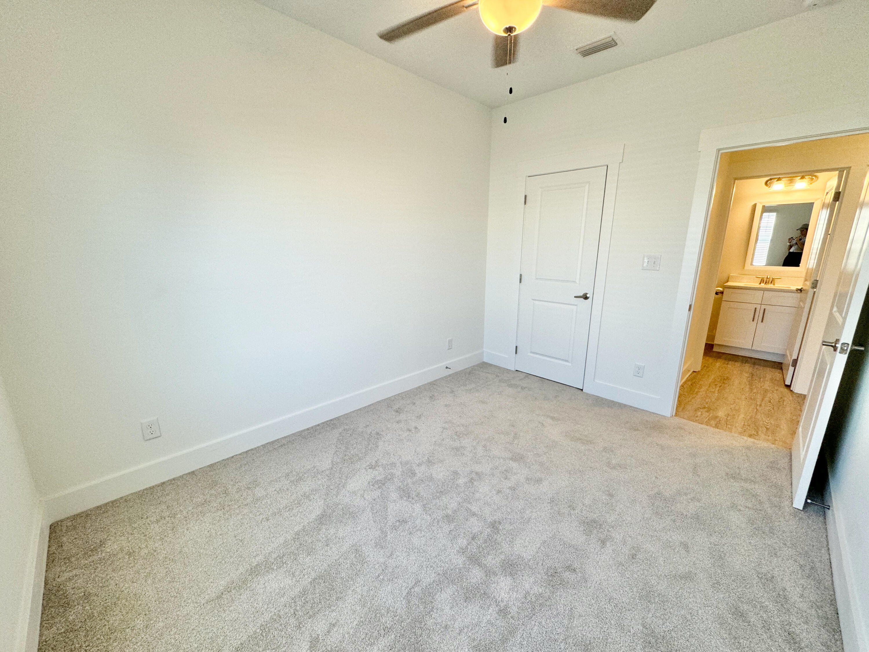 103 Date Palm Lane Freeport, FL 32439 - Photo 26 of 33 an empty room with a bathroom