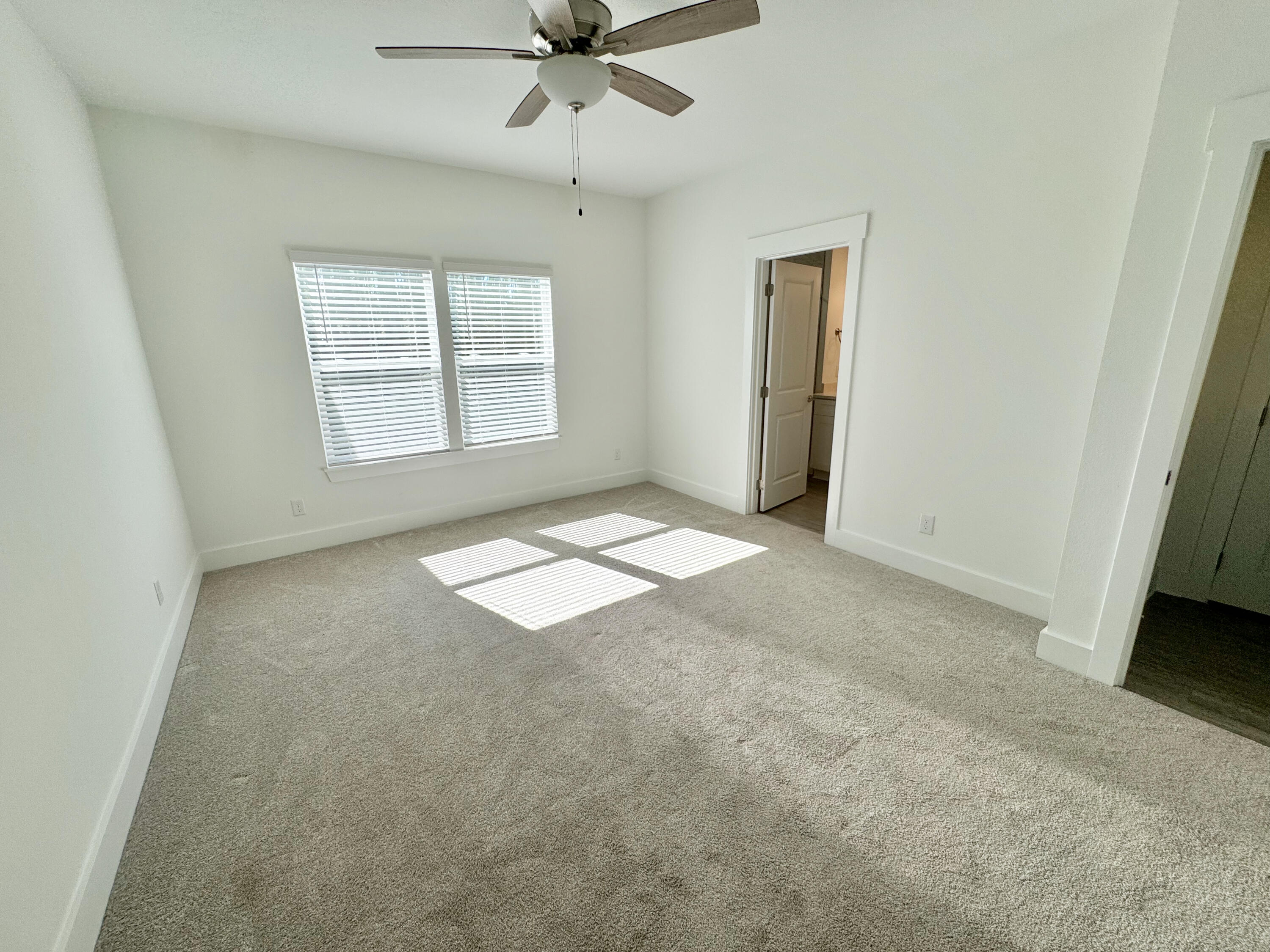 103 Date Palm Lane Freeport, FL 32439 - Photo 30 of 33 a view of an empty room with a window