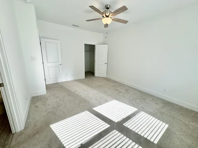a bathroom with a double vanity sink mirror double and shower