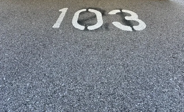 a view of a hallway with a wooden floor