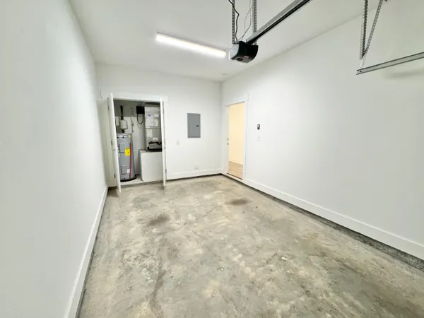 a bathroom with a toilet and a rug