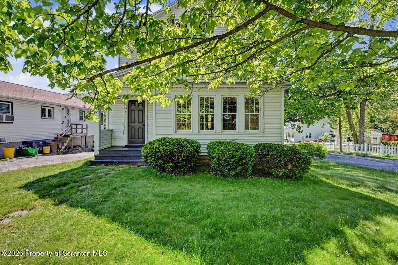 502 Layton Road Clarks Summit, PA 18411 - Photo 7 of 42 a front view of house with yard and green space