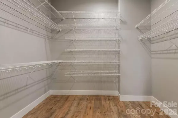 a view of a room with racks on the wall