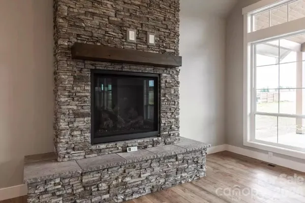 a living room with a fireplace