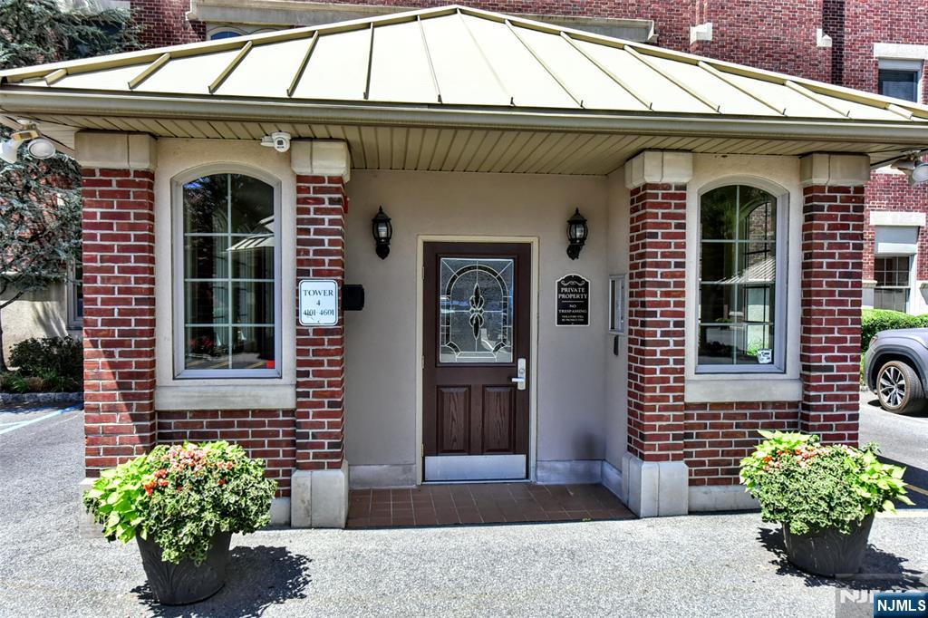 4201 Rio Vista Drive, Unit 4201 Mahwah, NJ 07430 - Photo 3 of 34 a front view of a house with outdoor seating
