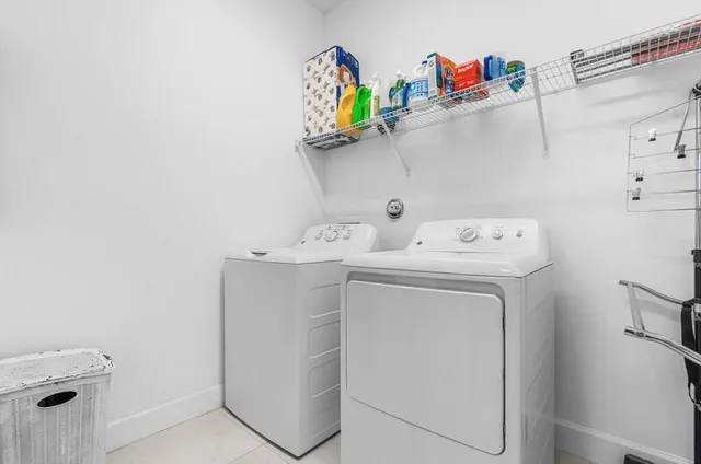 a view of yard with swimming pool and green space