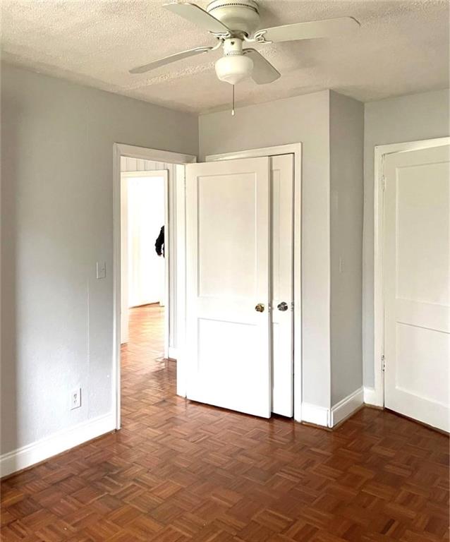 1443 Oxford Road Northeast, Unit 2 Atlanta, GA 30307 - Photo 2 of 7 a view of an empty room with wooden floor