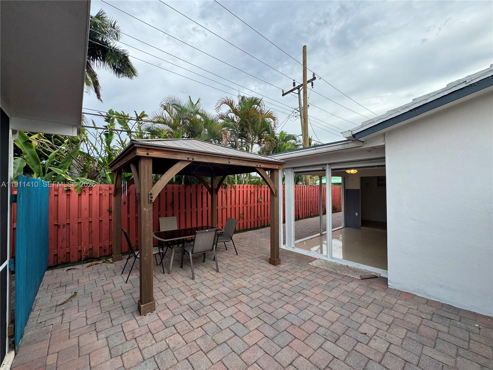 4578 Northwest 16th Avenue, Unit 4578 Tamarac, FL 33309 - Photo 21 of 24 an outdoor space with furniture