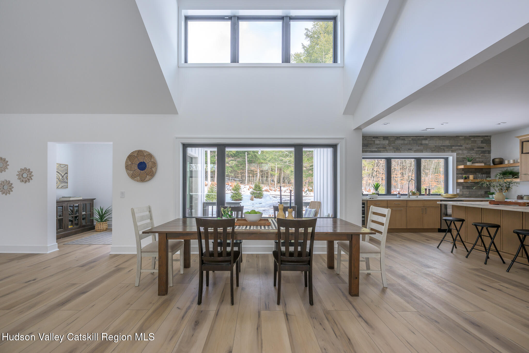 305 Mitchell Hollow Road Windham, NY 12496 - Photo 11 of 39 a view of a dining room with furniture window and wooden floor