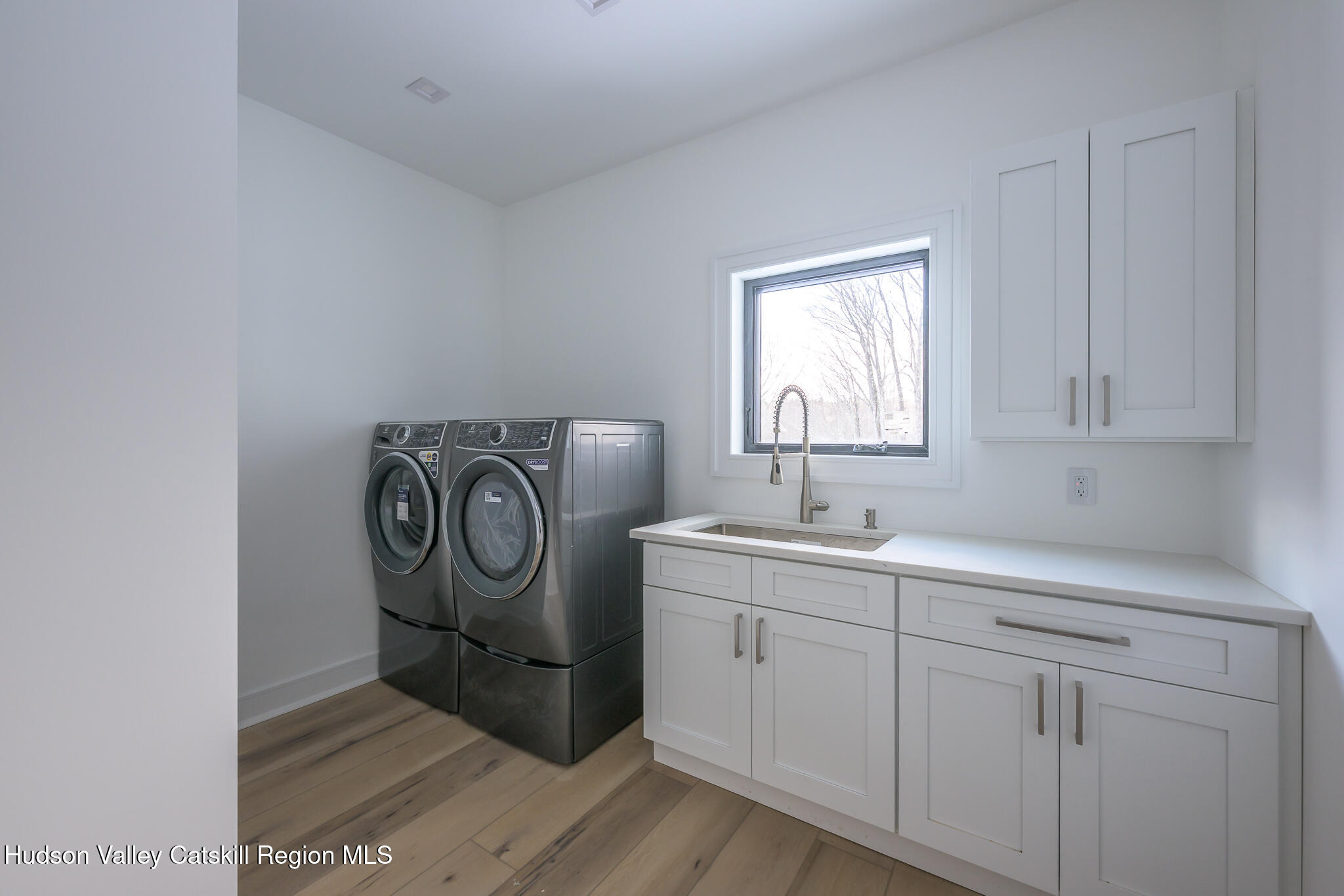 305 Mitchell Hollow Road Windham, NY 12496 - Photo 20 of 39 a utility room with sink dryer and washer