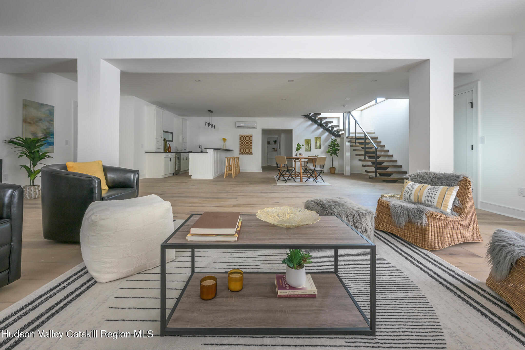 305 Mitchell Hollow Road Windham, NY 12496 - Photo 25 of 39 a living room with furniture and wooden floor